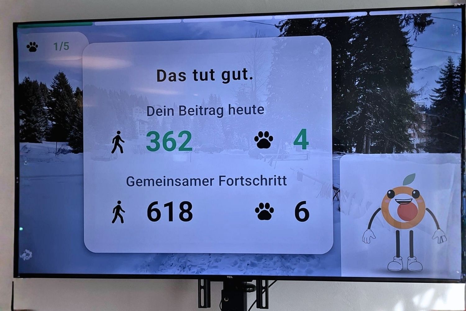 Movoya-Bildschirm zeigt den persönlichen Beitrag und gemeinsamen Fortschritt der Winter-Challenge